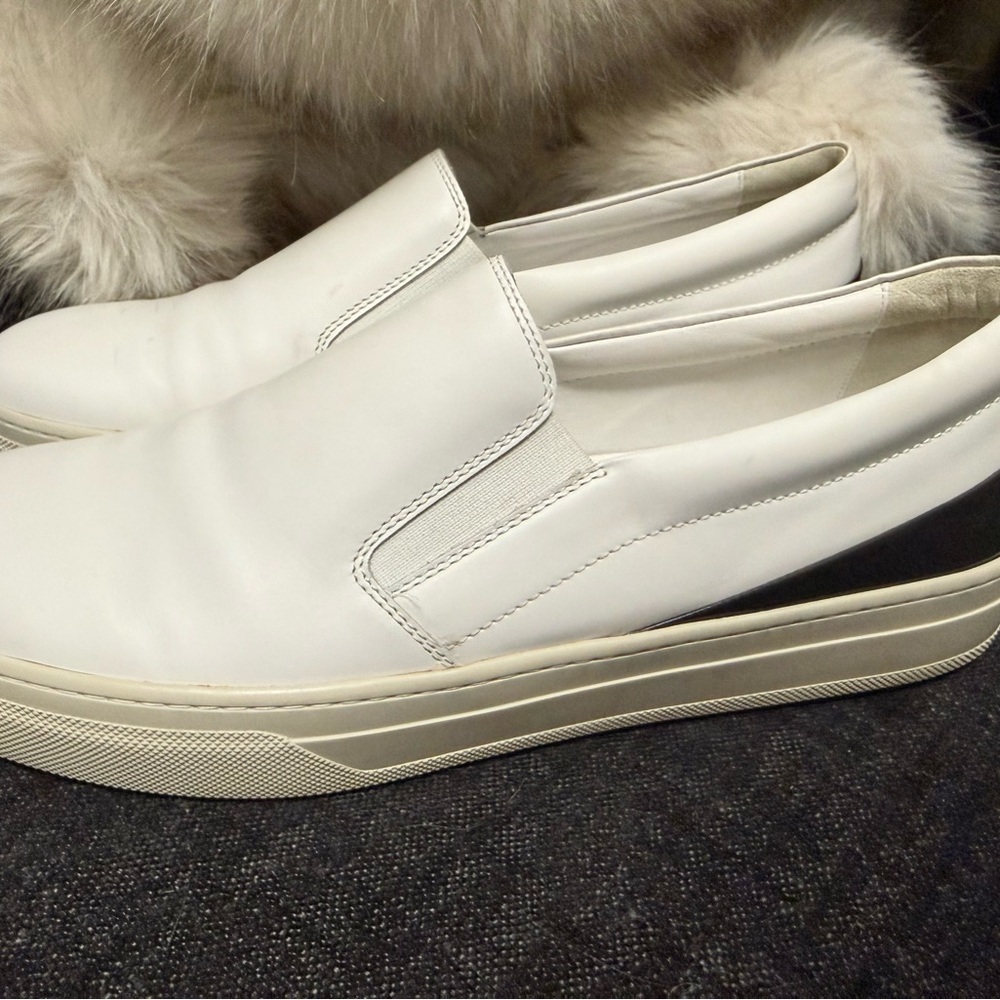 Tod's White Leather Slip-On Sneakers with Black Heel Accent